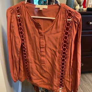 Burnt orange top with cutouts